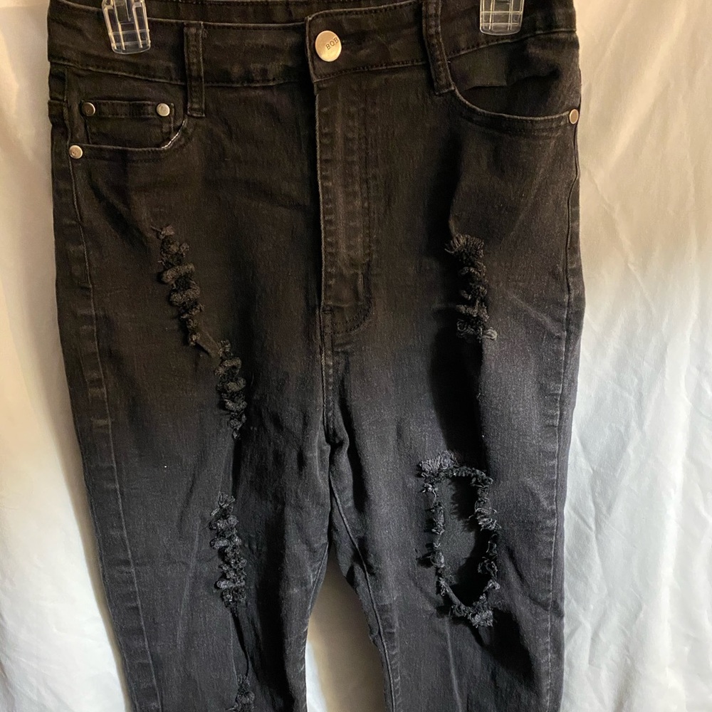High waisted, black skinny jeans.
